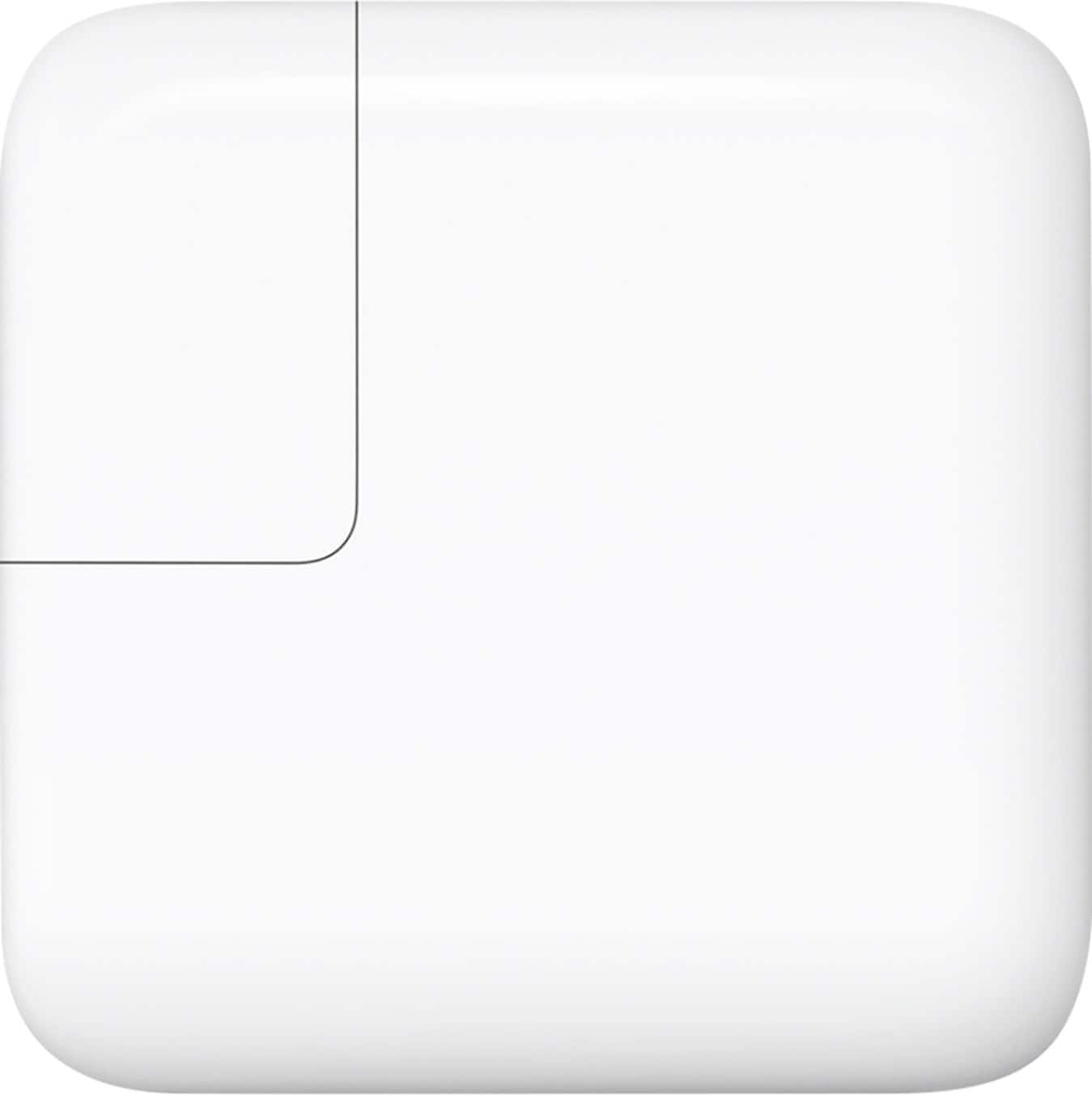 Apple 30W USB-C power adapter connected to a MacBook